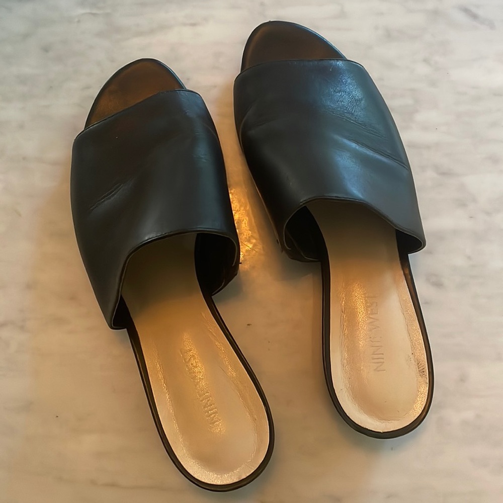 Black leather slides